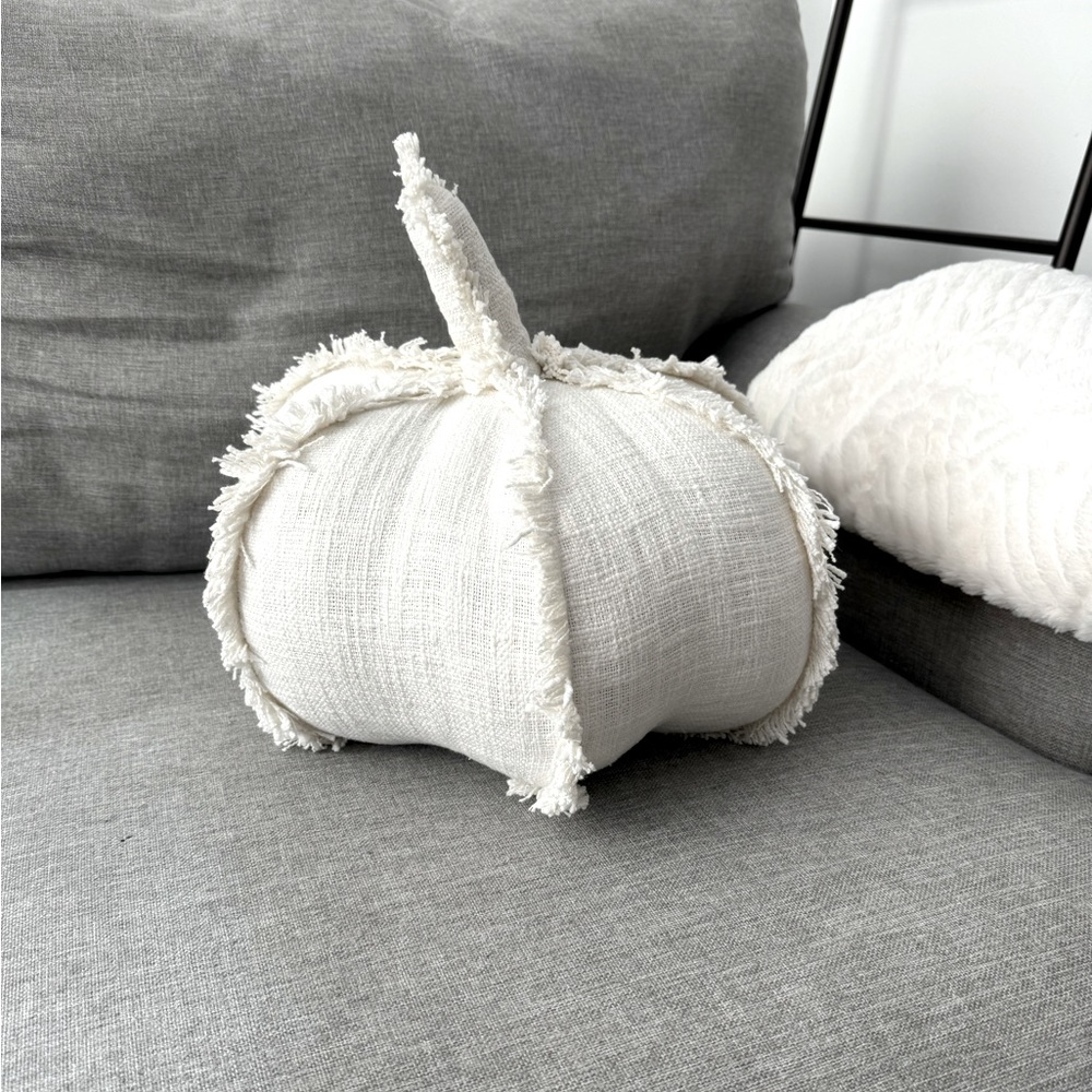 Ivory pumpkin shaped decorative pillow